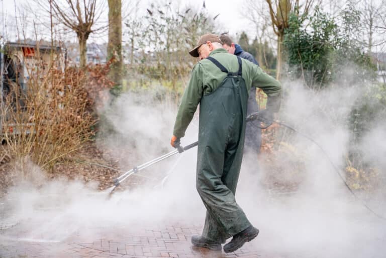 Oprit laten reinigen prijs